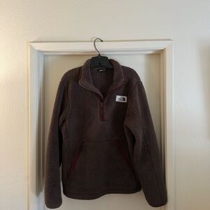 The North Face Men's 1/4 Zip Chocolate Brown thick fleece zip kangaroo pocket.